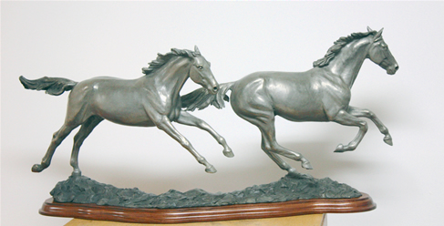 Bronze horses galloping, Running Free